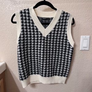 Black and white patterned sweater vest